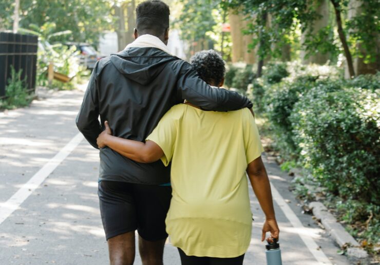 Man and woman outdoors walking together